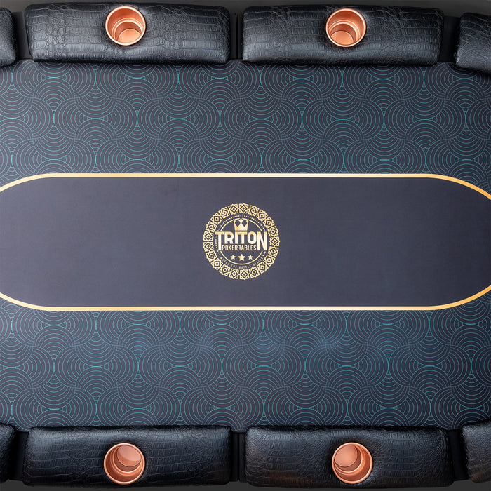 Close-up of a black inflatable boat with a patterned surface and Triton logo.