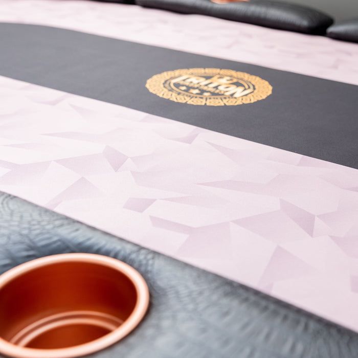Close-up of a diploma with a gold seal on a gray and white background