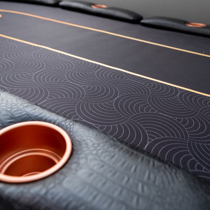 Close-up of a black leather with a cup holder.