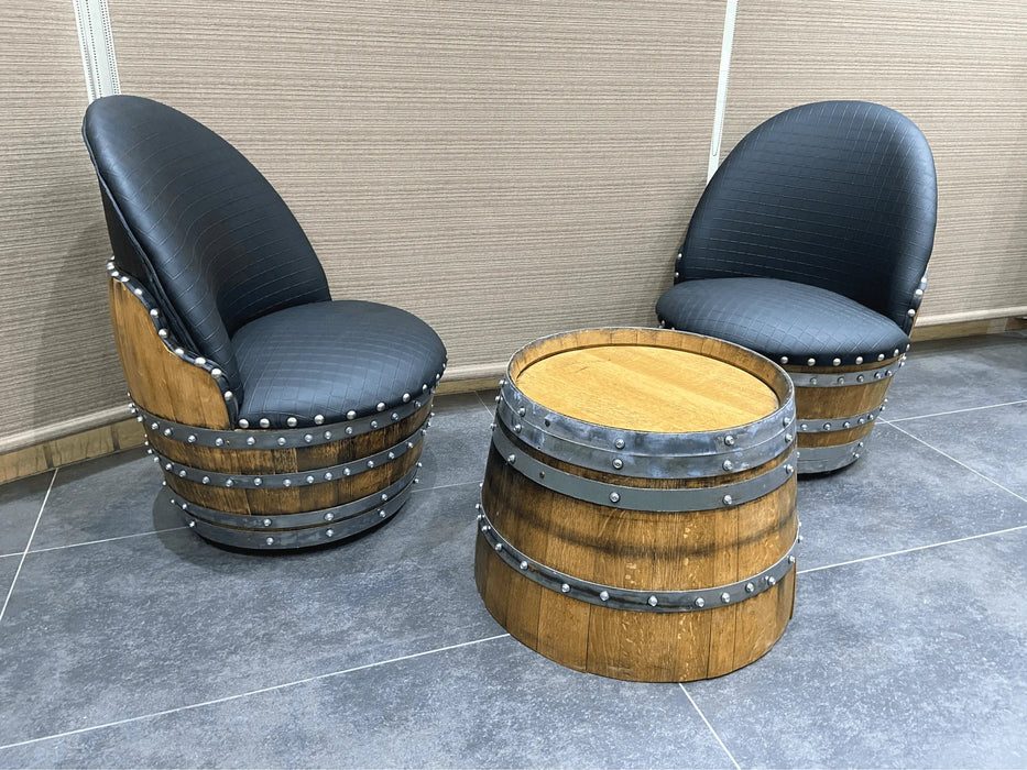 Two barrel-shaped chairs with black seats on a tiled floor.