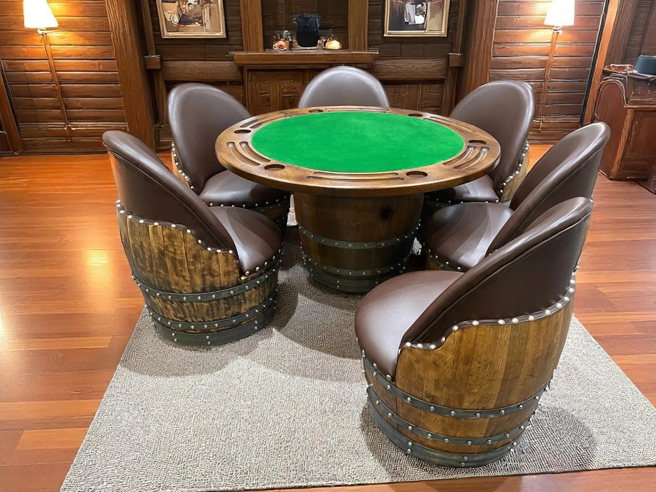 Wooden poker table with green felt surface surrounded by matching chairs in a room with wooden walls and floor.