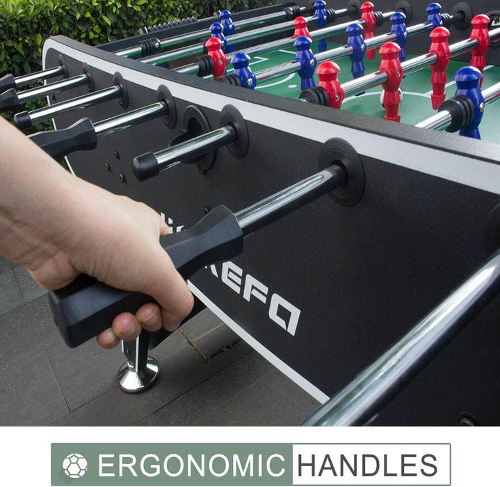 Person playing table football with KЕFA brand table in the background