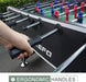 Person playing table football with KЕFA brand table in the background