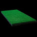 Green artificial grass mat on a black background