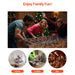Family playing foosball with Christmas tree in background, promotional image for family activities.