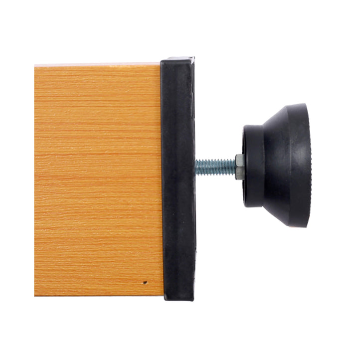 Wooden block with a black rubber bumper on a white background
