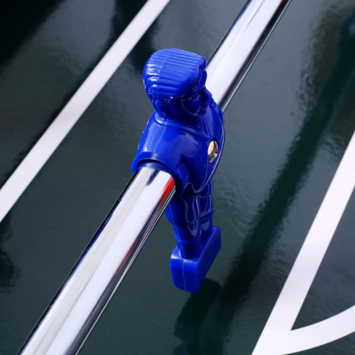 Blue foosball player on a table