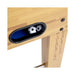 Wooden table with a small oval hole revealing two soccer balls inside.