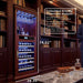 Wine cooler embedded in a wooden bookshelf with embedded-friendly dimension analysis.