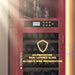 Wine cooler with UV-protective dual-layered glass door, displaying wine bottles inside.