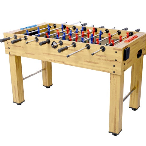 Foosball table with wooden surface and metal legs on a white background