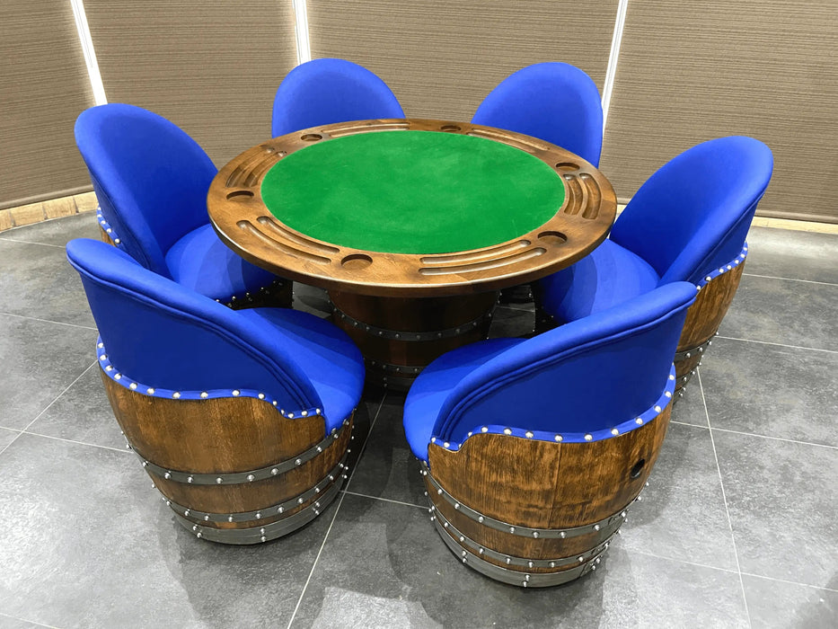 Poker table with green felt surface surrounded by blue chairs on a tiled floor.