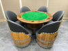 Wooden poker table with green felt surface surrounded by barrel-style chairs on a tiled floor.