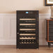 Wine cooler with wine bottles inside in a room setting