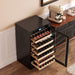 Wine cooler with wine bottles inside, placed next to a coffee machine on a wooden counter.