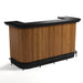 Wooden bar counter with black top on a white background