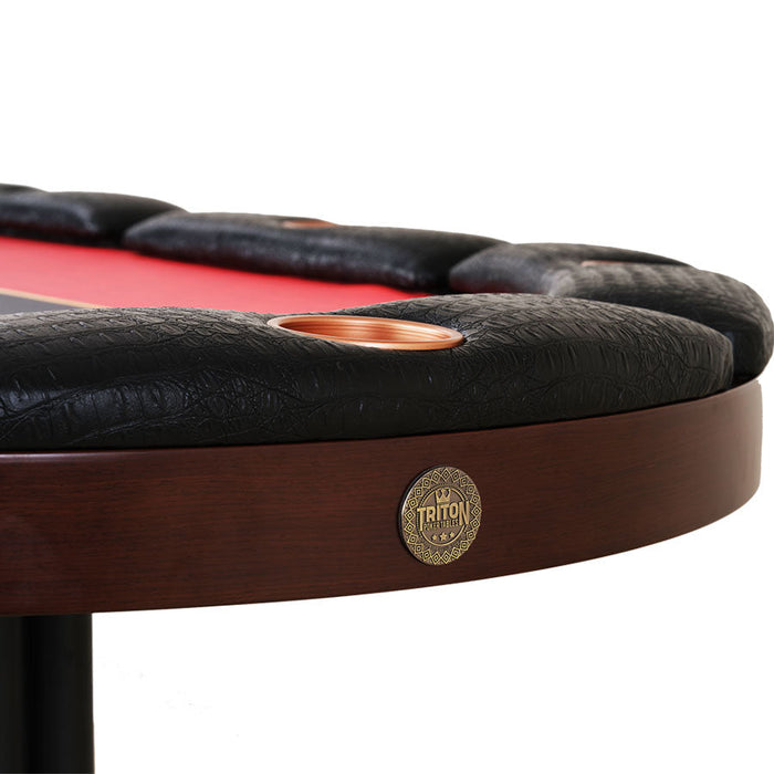 Close-up of a black and red pool table with a visible brand logo on a white background