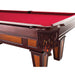 Pool table with red felt surface and decorative corner piece on a white background