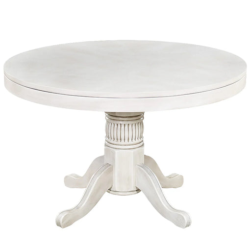 Round white table with a decorative pedestal base on a white background