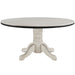 Round dining table with a white base and black top on a white background