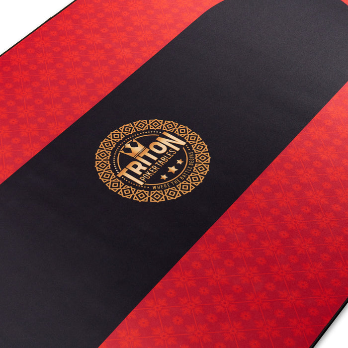 Red and black mat with a gold logo in the center