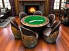 Poker table with barrel chairs in a cozy room with a fireplace.