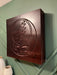 Wooden box with a Grateful Dead logo on a green wall