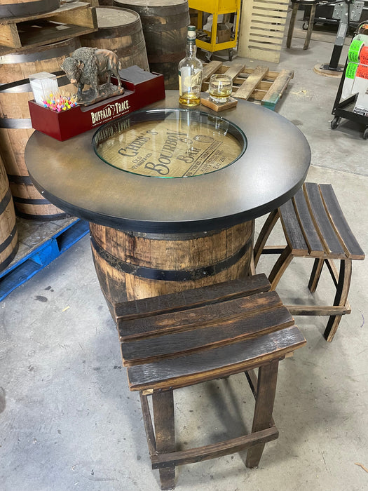 Barrel-shaped table with stools in a warehouse setting