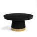 Black round table with a gold base on a white background