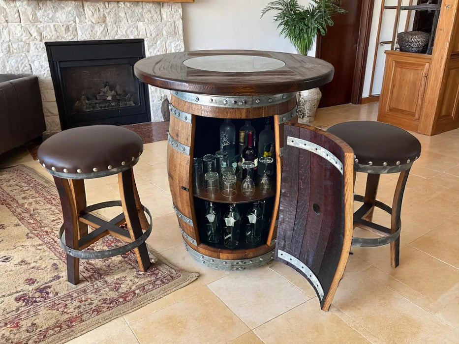 Wine barrel bar with glass shelves, stools, and a fireplace in the background.