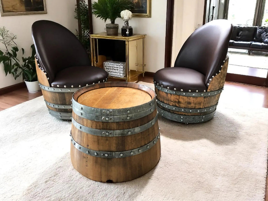 Two barrel chairs with a matching table in a living room setting.