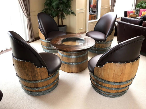 Wooden barrel chairs with a central table in a room setting.