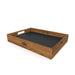 Wooden tray with a black interior on a white background