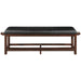 Black leather bench with wooden frame on a white background