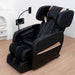 Black massage chair with control panel on a wooden floor