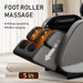 Massage chair with foot roller massage feature on a neutral background