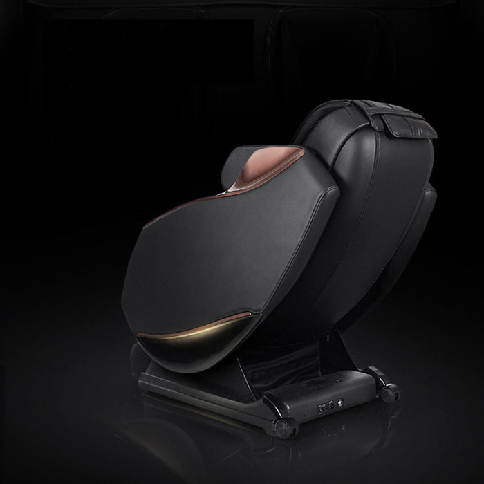 Black massage chair on a dark background