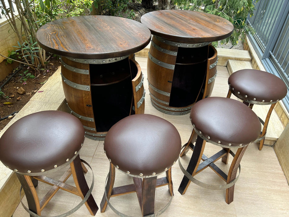 Wooden barrel tables with matching stools on a patio