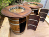 Wooden barrel table with seats on a wooden deck