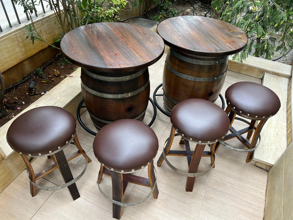 Wooden barrel table with matching stools on a patio