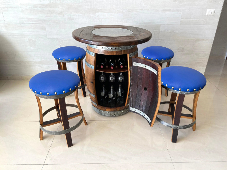 Bar set with wooden barrel table and blue stools in a room.