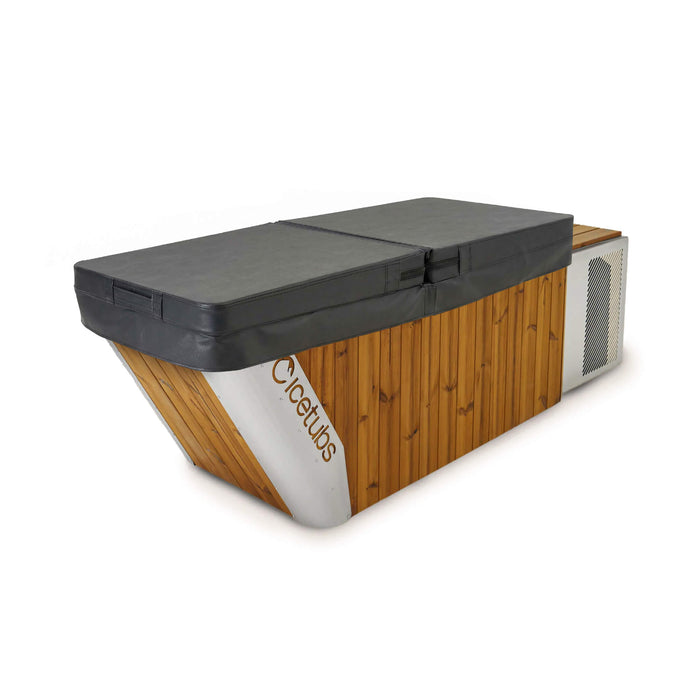 Wooden hot tub with a black lid on a white background