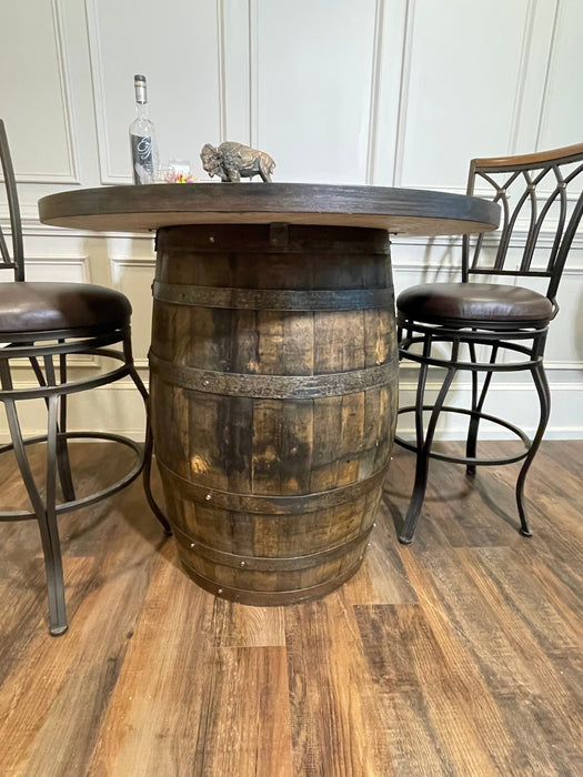 Wooden barrel table with bar stools in a room setting