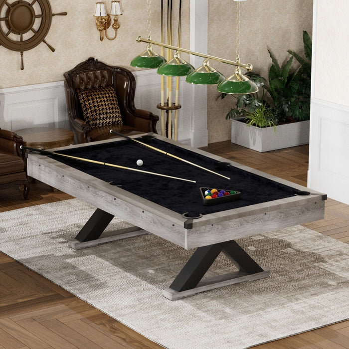 Pool table in a room with decorative elements and furniture.