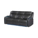 Black leather sofa with blue accents on a white background