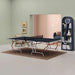 Modern room with a ping pong table, bookshelf, and decor items.