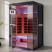 Infrared sauna with glass door in a modern interior setting