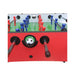 Tabletop soccer game with red and blue player figures on a white background
