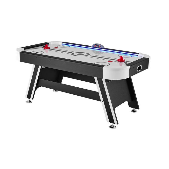 Air hockey table with red and blue pucks on a white background