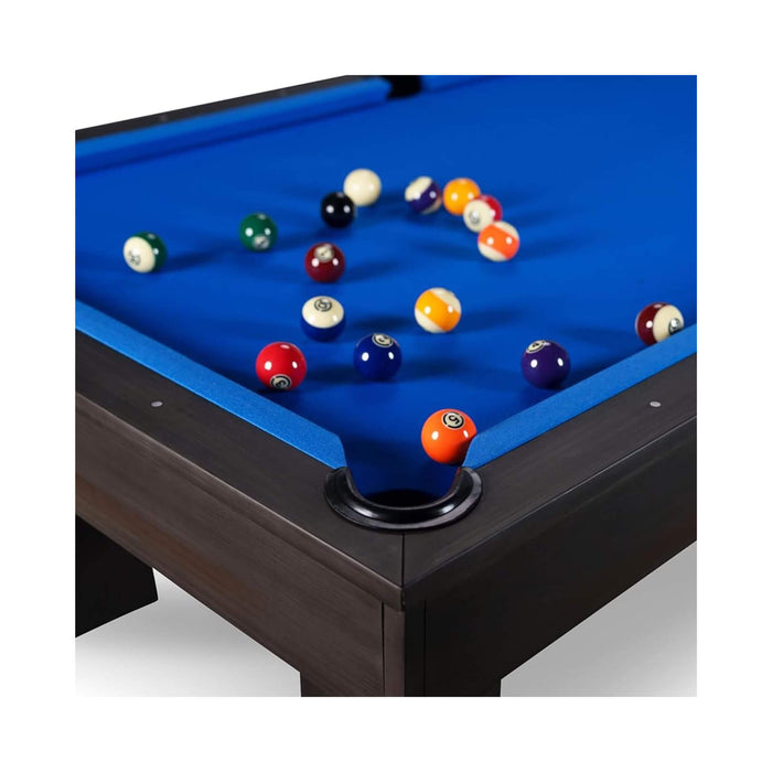 Pool table with billiard balls on a blue felt surface